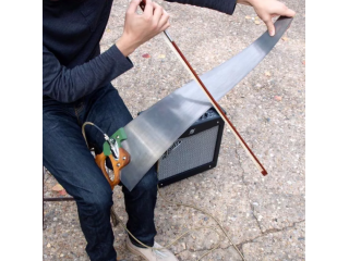 Необычные музыкальные инструменты, изобретенные в наши дни - «Музыкальная пила»